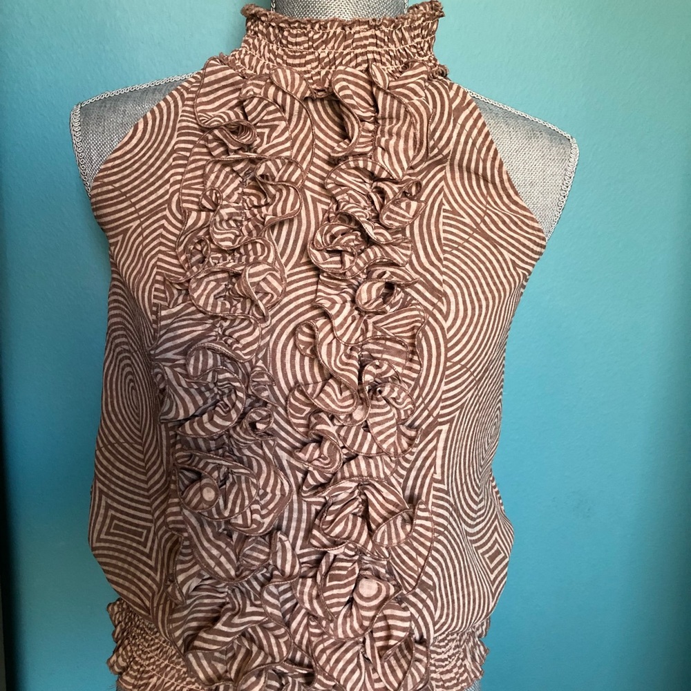 Neutral color ruffle top.